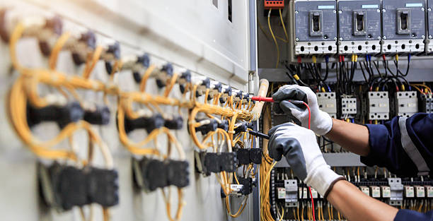 Professional Electrician technician working in Hughes Springs, TX